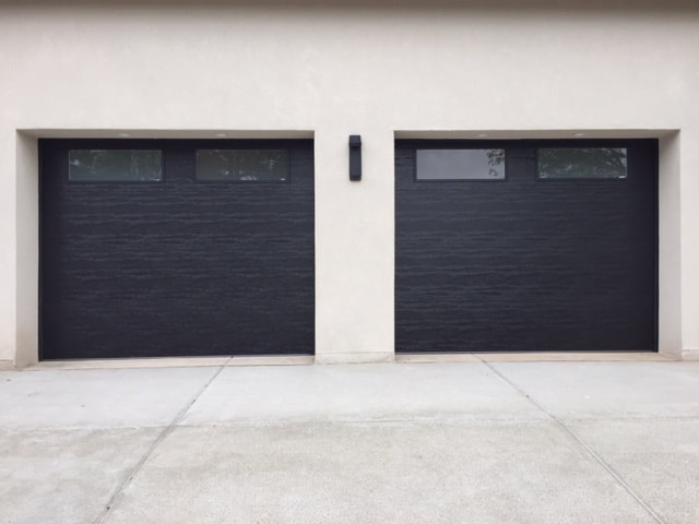Maintaining Normalcy and Security with Garage Door Services - Modern Steel Collection with Black Finish
